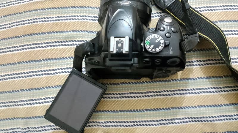 DSLR Nikon d5100 with 18-105 lens 4