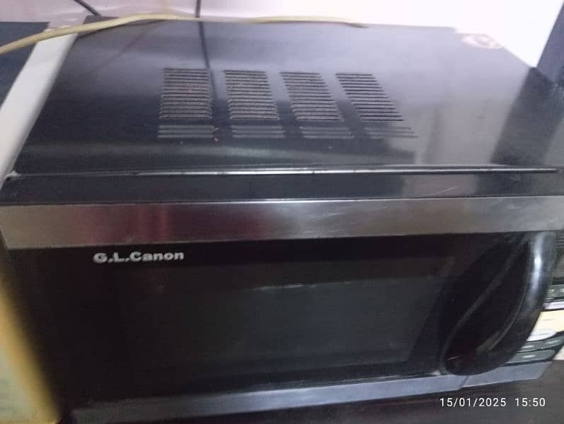 G L Canon  microwave + grill , combination oven 5