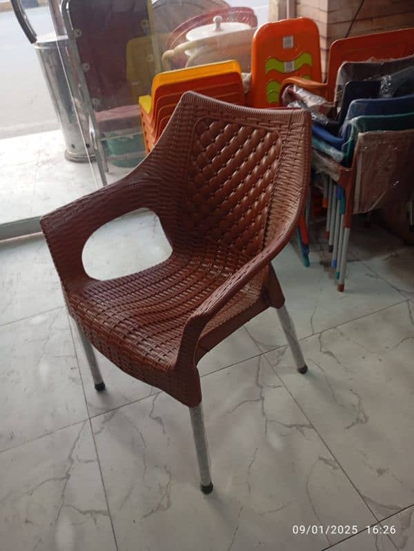 4 plastic chairs with one folding table set 1