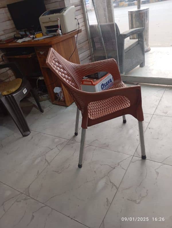 4 plastic chairs with one folding table set 2