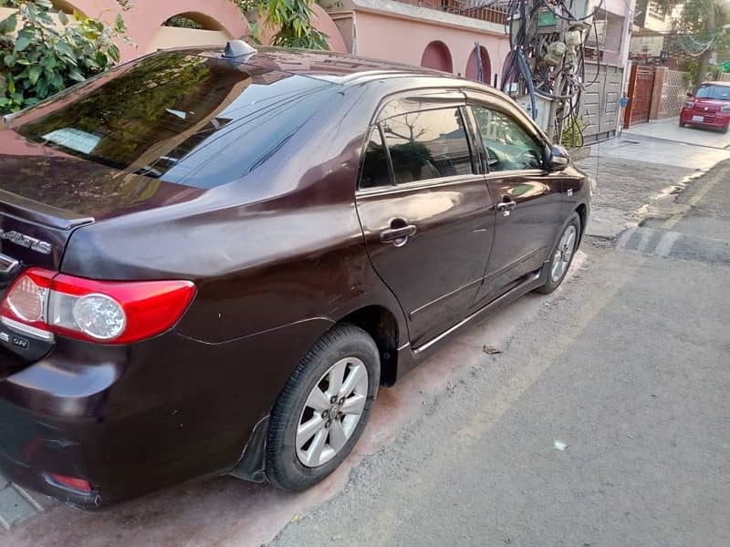 Toyota Corolla Altis 1.6 sun roof 2012 6