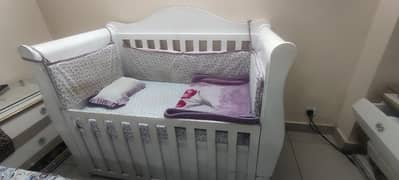 Wooden baby cot