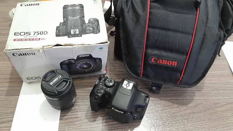 Canon 750d with Stm lens 18-55 and box accessories 1