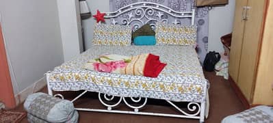 Iron double bed for sale .