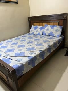 double bed wooden with mattress