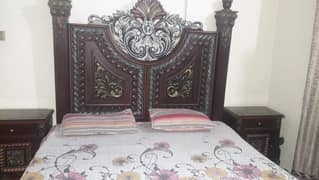 king size wooden bad with  two side table and dressing