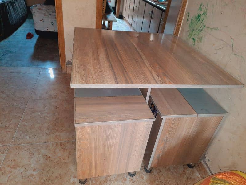 Dinning Table with sitting boxes. 4