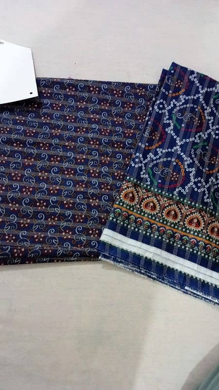 all over 3pc lawn suits with zary lines 3