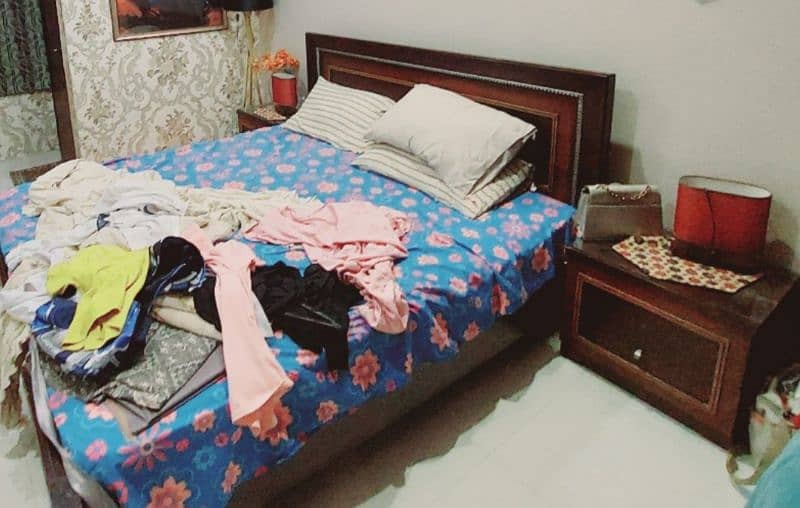 solid wooden bed 2 side tables i bought from habbit furniture 1