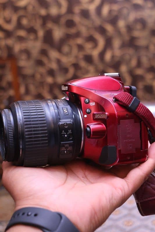 Nikon d5200 with 18/55mm Red product. 1