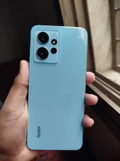 I am selling Redmi note 12 8gb vs 128 GB condition 10 by 10 ha