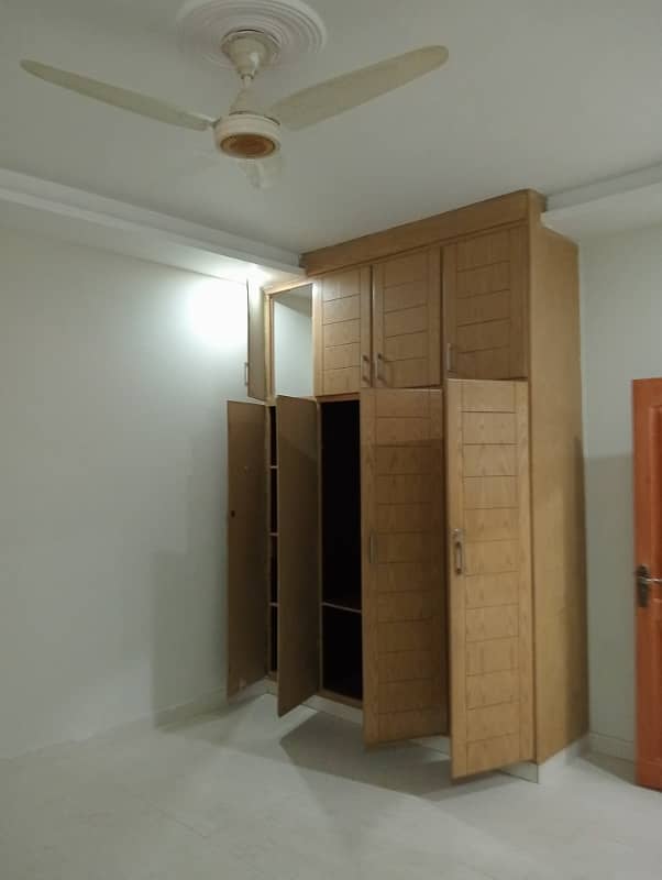 10marla 2beds DD TV lounge kitchen attached baths neat clean corner house open basement for rent in G 13 4 islamabad 4