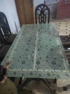 dining table ,6 wooden chairs with poshes for sale