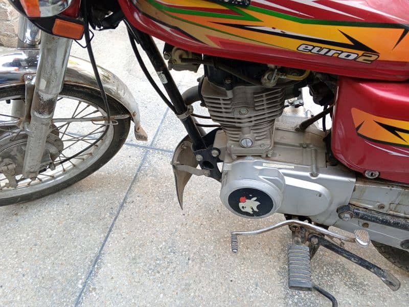 united cg 125cc us euro-2 bike red colour lahore number good condition 14