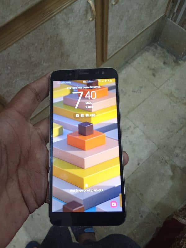 Samsung j6 9 by10 condition with original box and charger 9