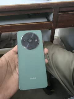 Redmi A3 9by10 condition 4.128 with original charger