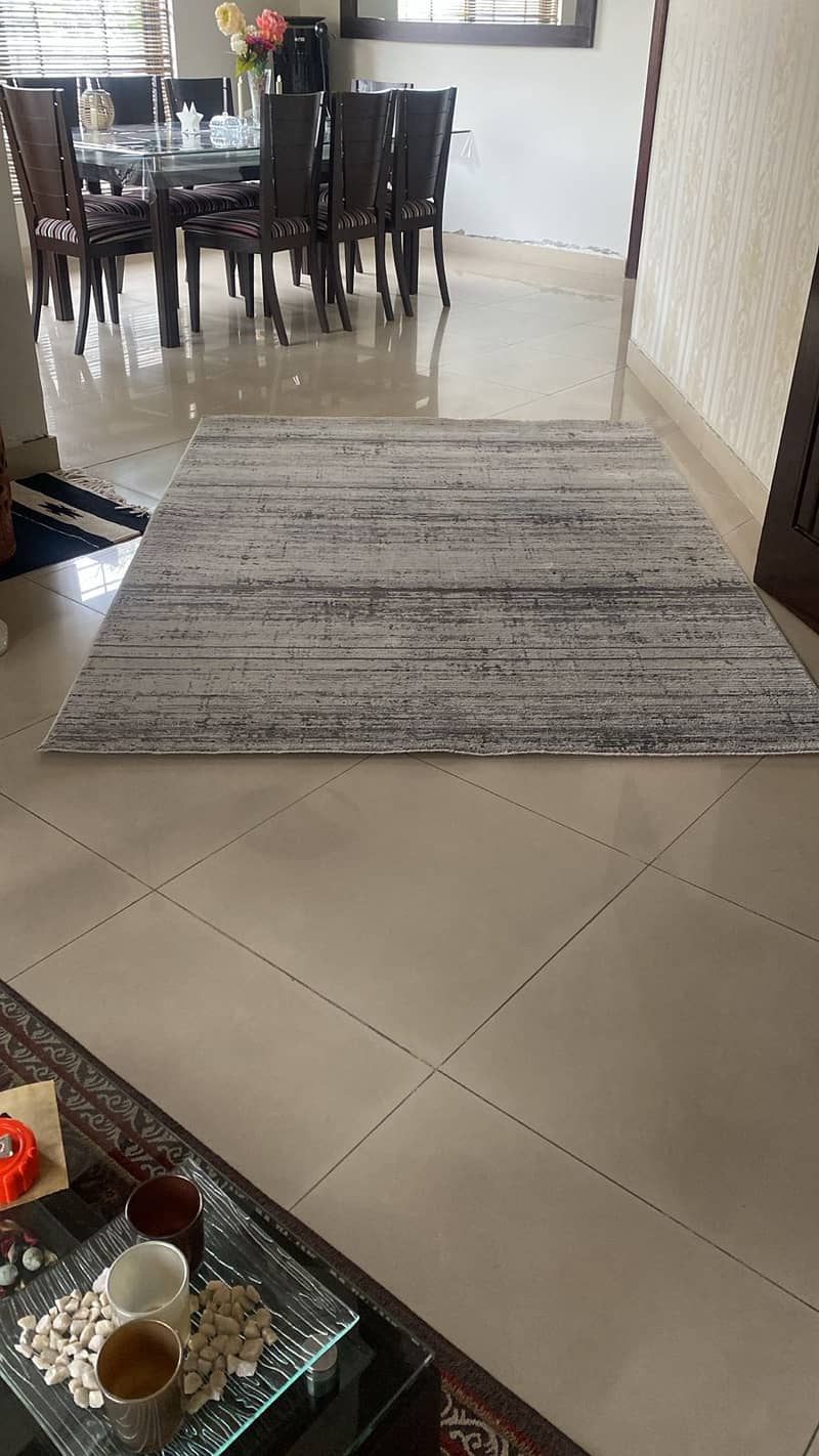 Two nice carpets selling cheap in DHA Phase 2 1