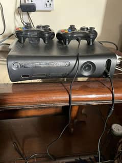 xbox360 320gb with two controllers one wired with alot of games