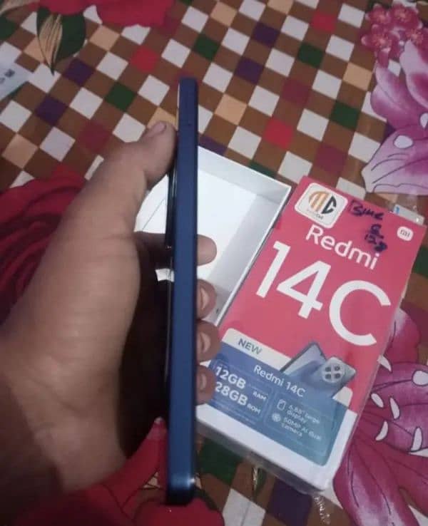 REDMI 14C 6 + 128 GB 1