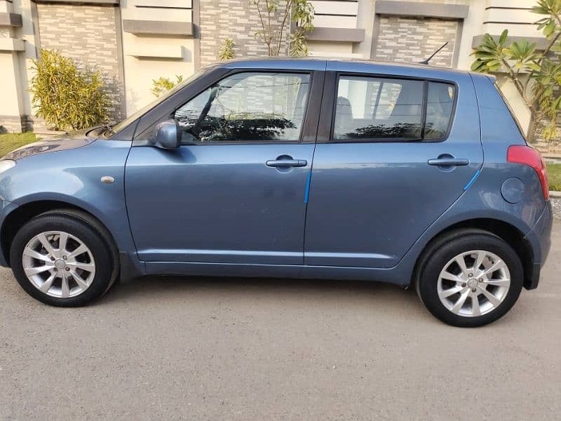 Suzuki Swift Dlx model 2011 original light blue color 5