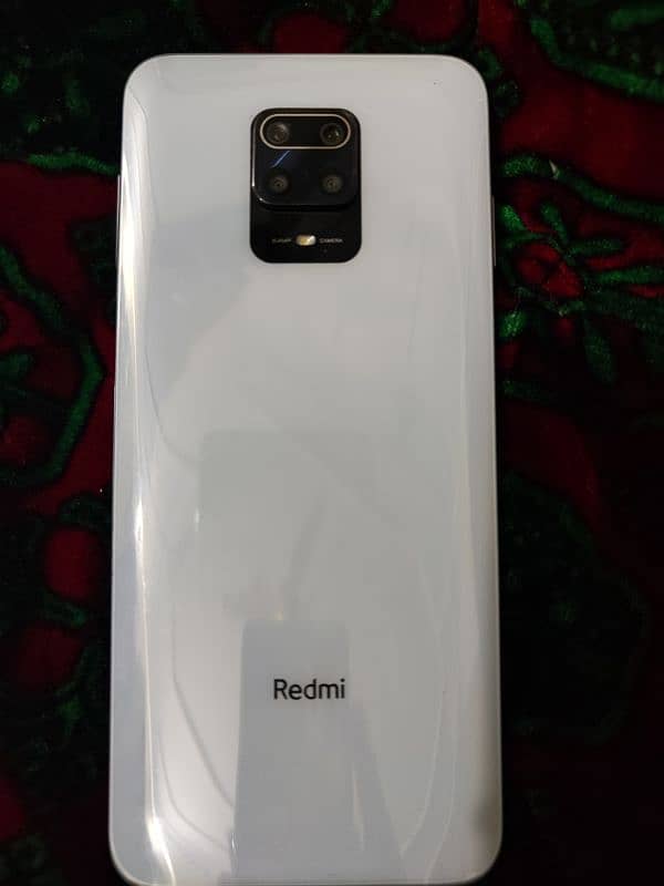 redmi note 9s white only back change and charger jack condition 90% 0