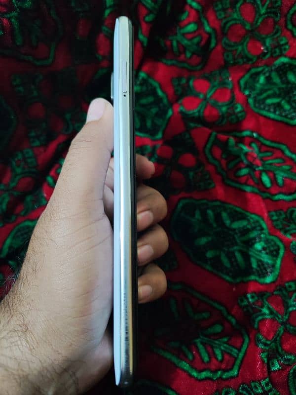 redmi note 9s white only back change and charger jack condition 90% 4