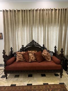 Original wooden sofa with antique polish