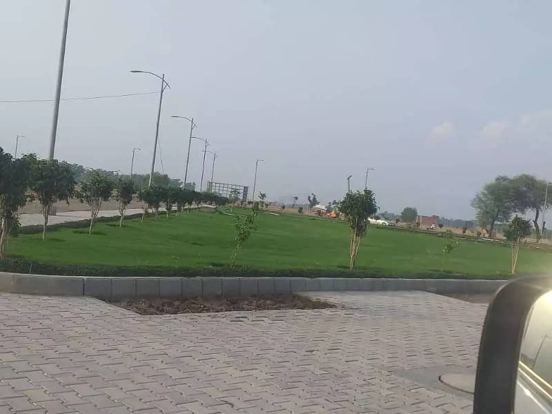 20 Marla Residential Plot Surrounding House Available Back Of Main 100Feet Wide Road Lift Rights Houses Available For Sale 1