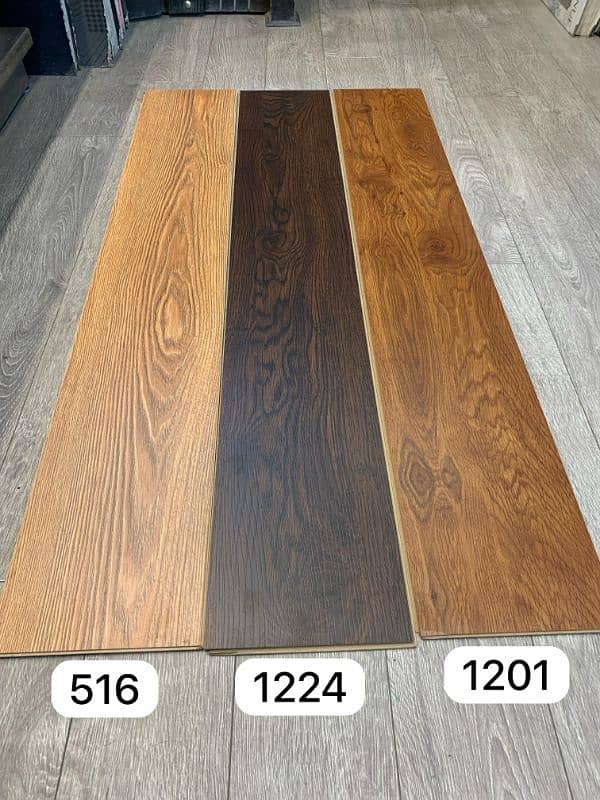 Laminate wood flooring, window blinds, wallpapers, Spc Flooring. 5