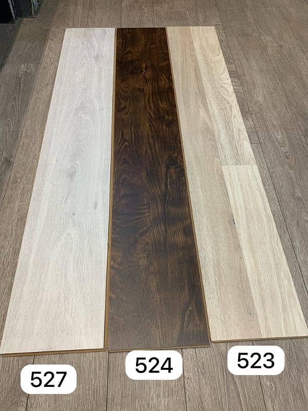 Laminate wood flooring, window blinds, wallpapers, Spc Flooring. 7