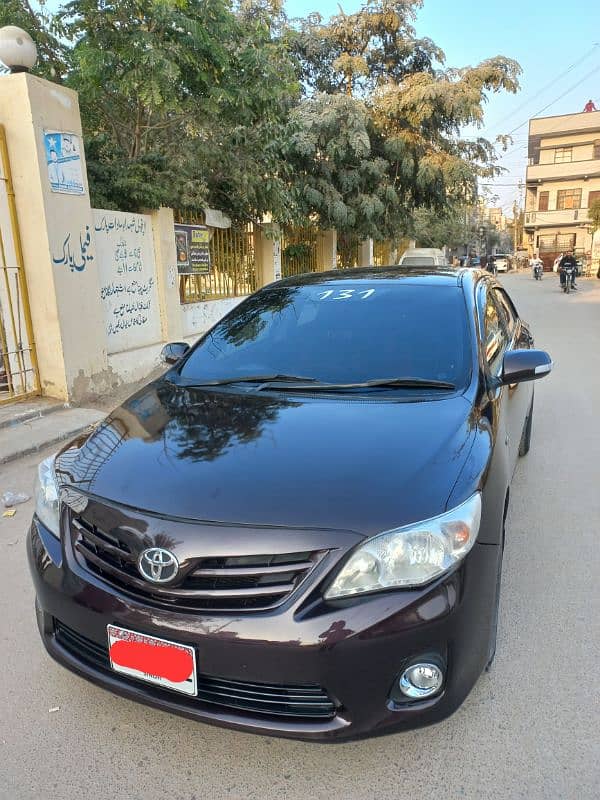 Toyota Corolla GLI 1.6 (2013) 1