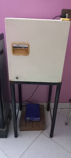 room fridge with iron stand