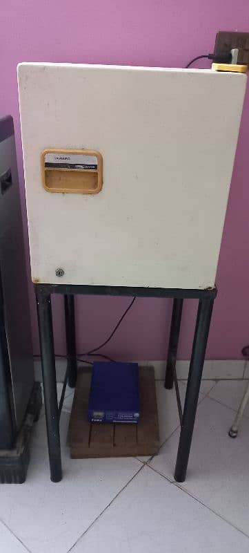 room fridge with iron stand 0