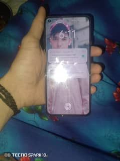 one plus 9 5G 8/128 just back pr paper hata Howa hay Bhai phone okay h