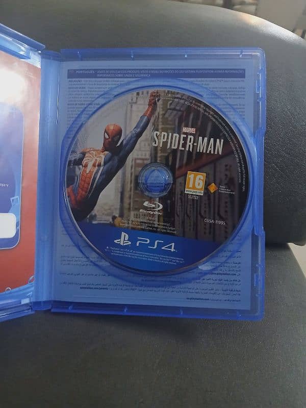 Spiderman 2018 ps4 [UAE version] used and spiderman miles morales ps5 2