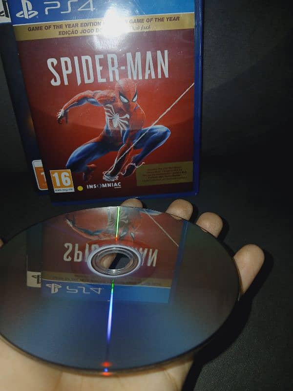 Spiderman 2018 ps4 [UAE version] used and spiderman miles morales ps5 3