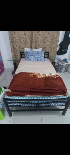 Rod iron bed with Master spring mattress