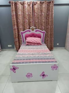 I am selling single bed dressing with curtain also,and iron stand, i