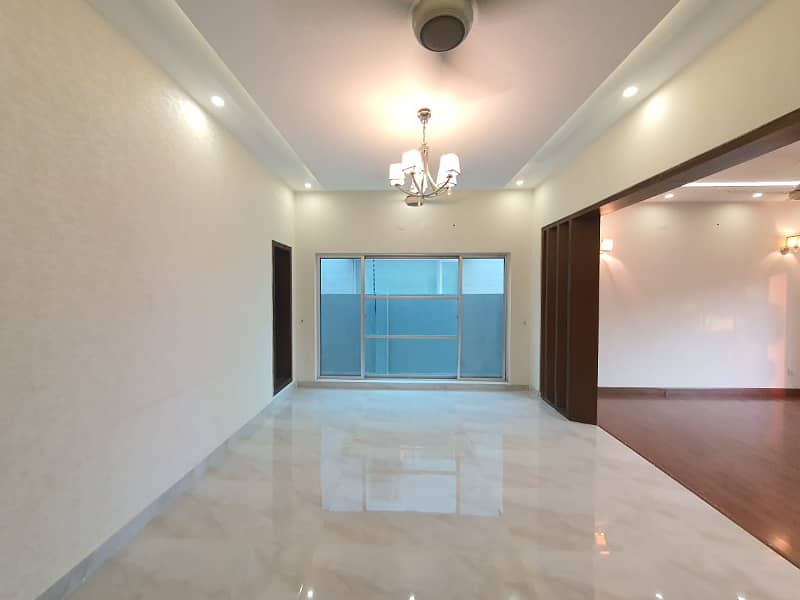 One Kanal Gorgeous Bungalow For Rent Prime Location DHA PHASE 4 Near Park 1