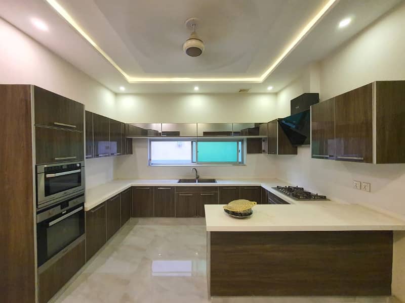 One Kanal Gorgeous Bungalow For Rent Prime Location DHA PHASE 4 Near Park 3