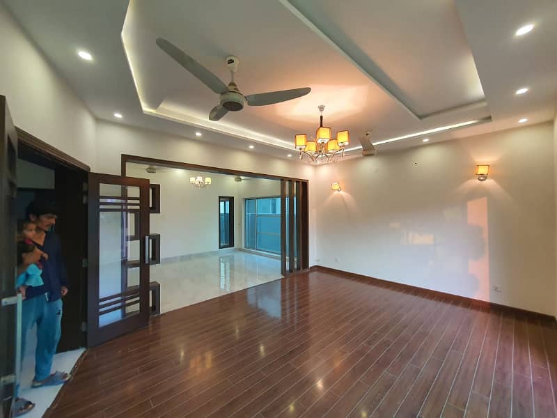 One Kanal Gorgeous Bungalow For Rent Prime Location DHA PHASE 4 Near Park 9