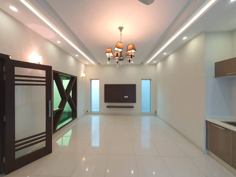 One Kanal Gorgeous Bungalow For Rent Prime Location DHA PHASE 4 Near Park 18