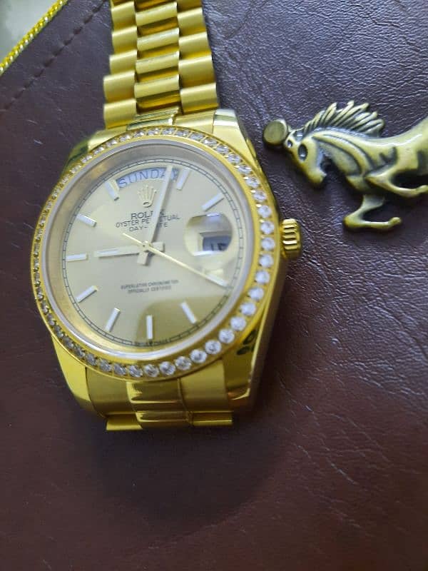 Rolex golden watch 0