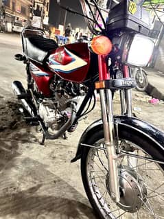 well maintained Honda 125 with genuine tanky, new tires 100% okay bike