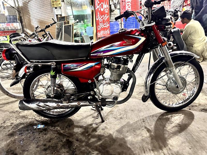 well maintained Honda 125 with genuine tanky, new tires 100% okay bike 5