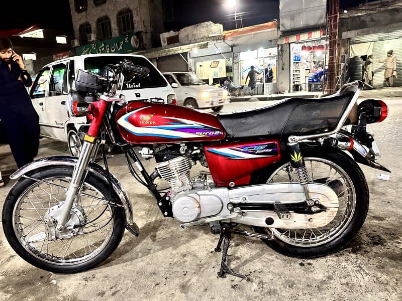 well maintained Honda 125 with genuine tanky, new tires 100% okay bike 6