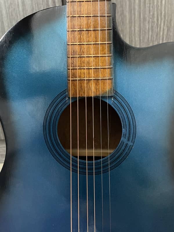 blue colour 6 string guitar 1