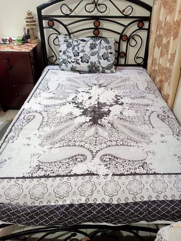 single iron bed with mattress and iron stand 1