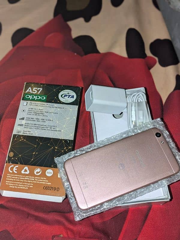 Oppo A57 new phone box and charger be ha 1