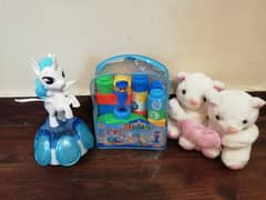 musical unicorn, stuff toy, blocks, smurf shoes